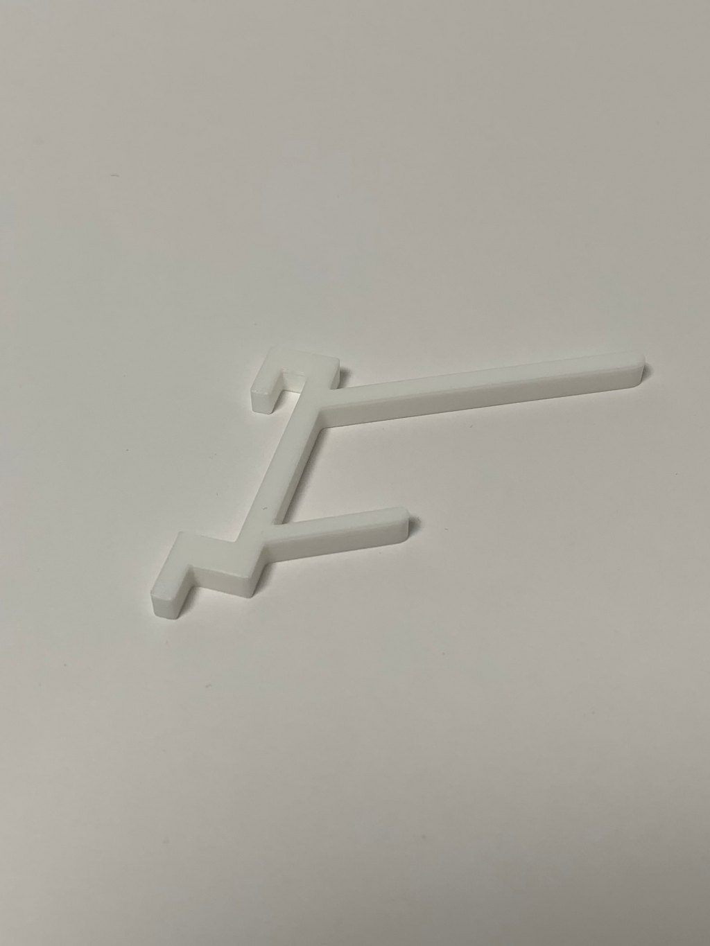 Trådsnelleholder med spolekrok