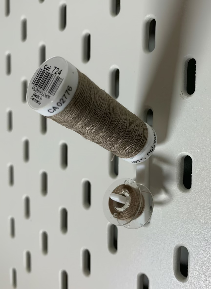 Trådsnelleholder med spolekrok